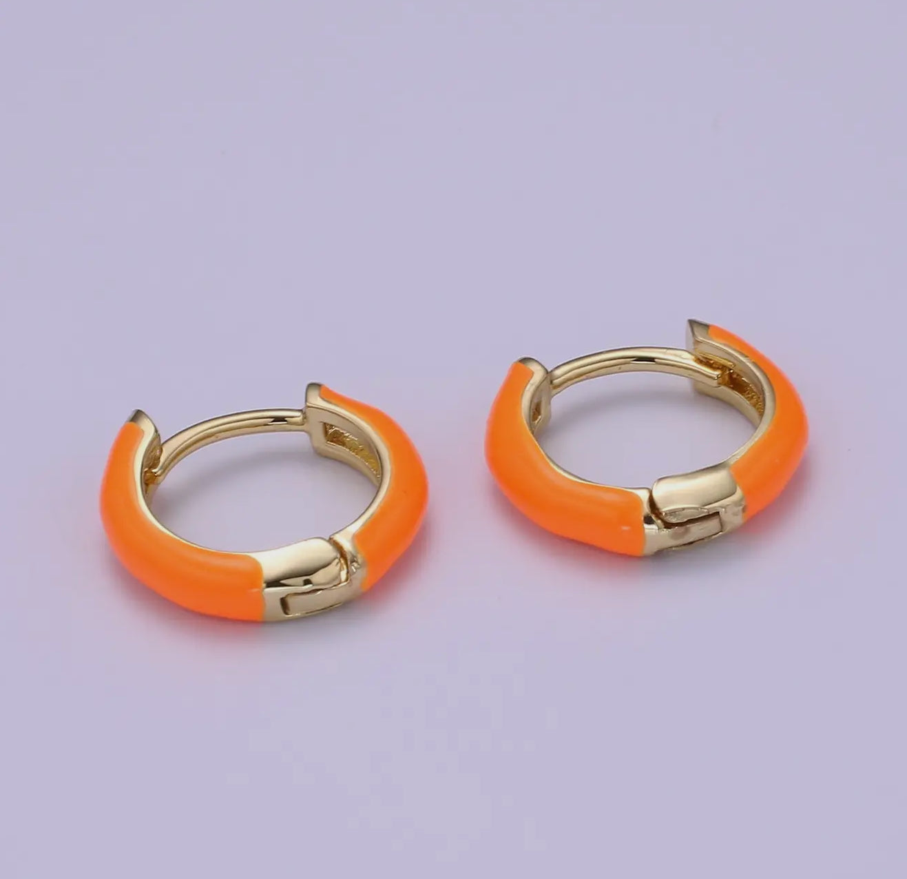 Orange Huggie Hoops